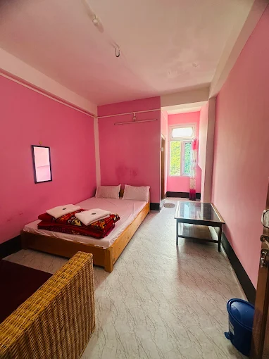Spacious pink room at Yangzom Homestay Near ITI Dirang